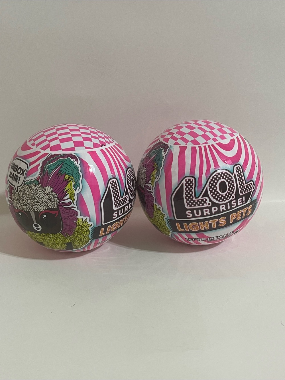2x LOL Surprise Lights Pets-9 Surprises Plus A Black Light Surprise